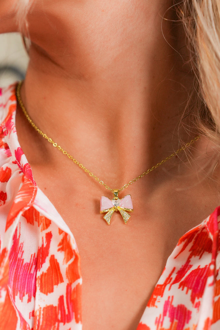 Collier ras du cou plaqué strass avec nœud papillon