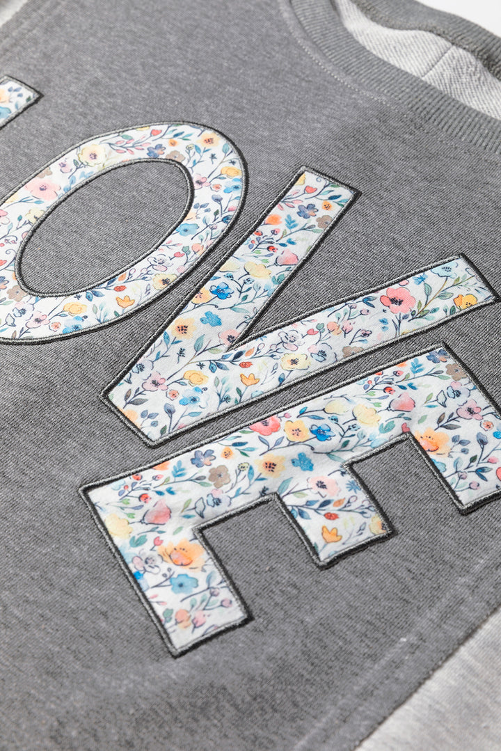 LOVE Graphic Exposed Seam Patchwork Uneven Hem Chic Sweatshirt