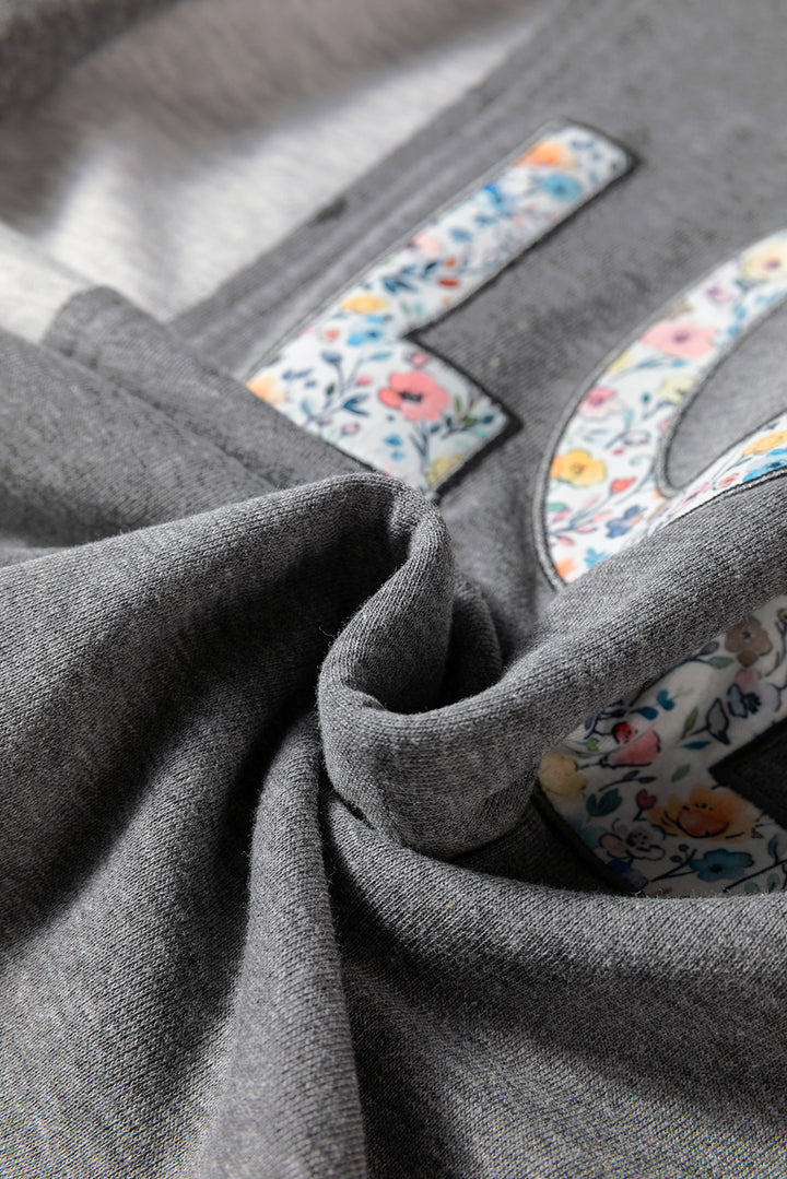 LOVE Graphic Exposed Seam Patchwork Uneven Hem Chic Sweatshirt