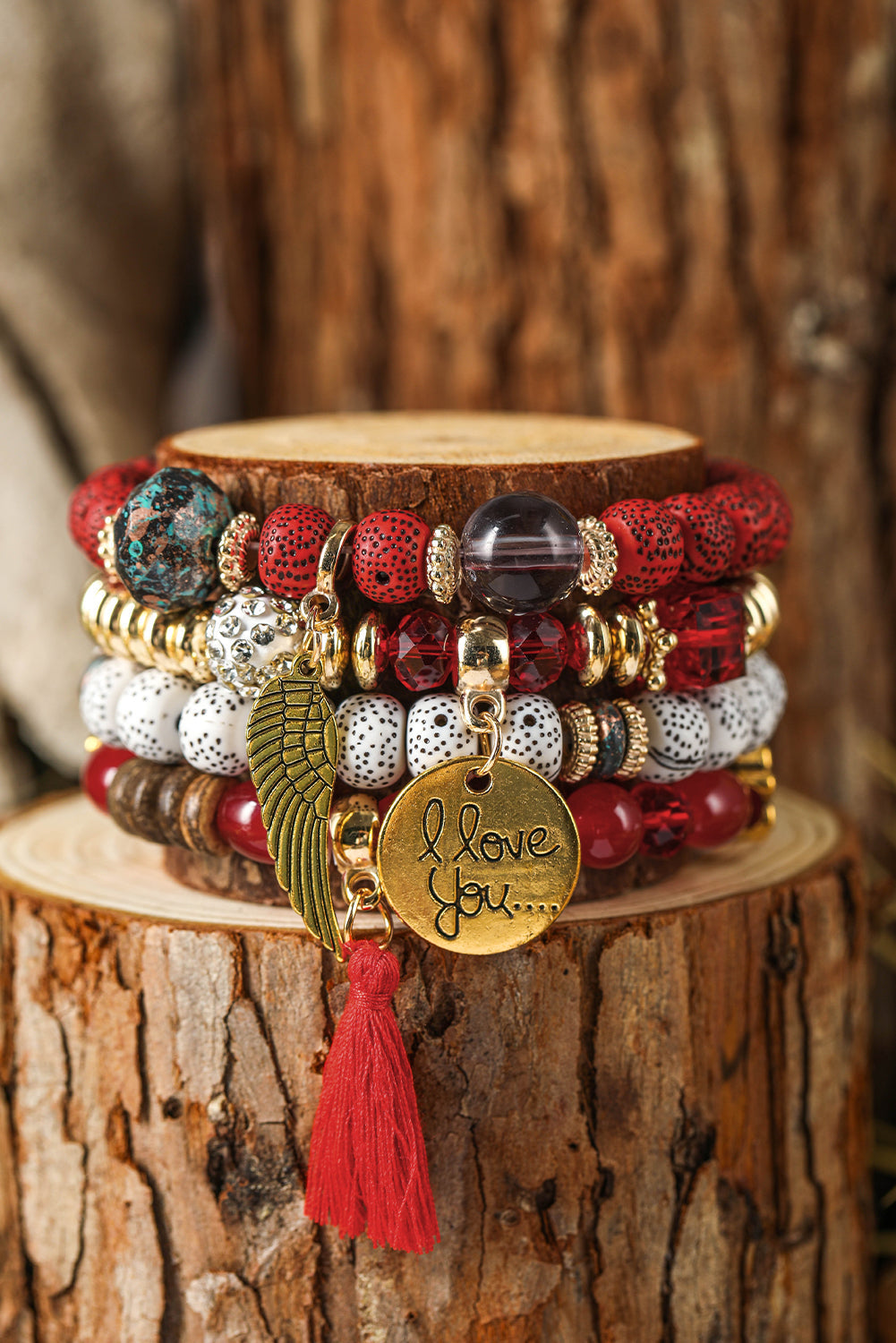 Ensemble de 4 bracelets bohèmes avec pendentifs en forme d'ailes et de disques