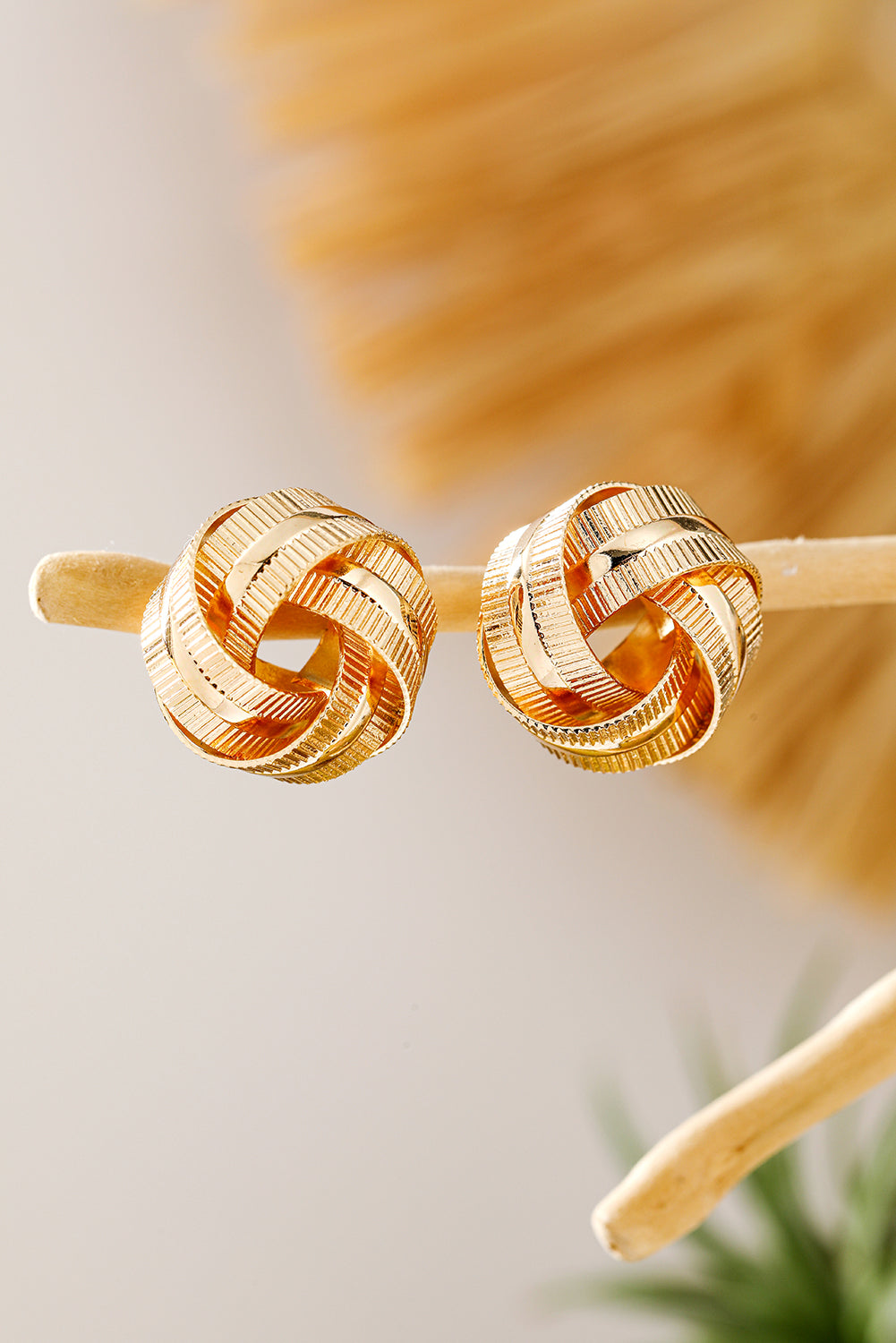 Boucles d'oreilles à tige en forme de nœud texturé plaqué