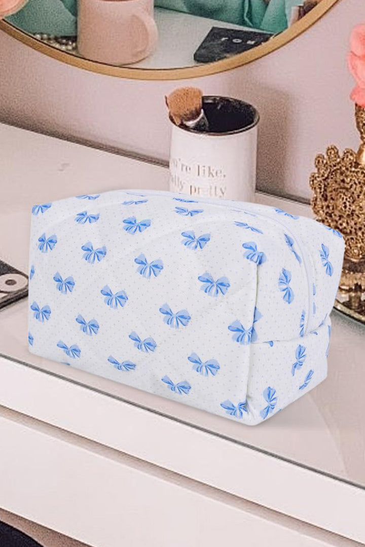 Trousse de maquillage matelassée à fermeture éclair et nœud papillon
