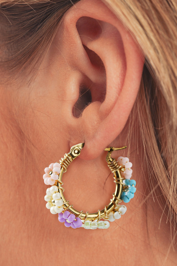 Boucles d'oreilles créoles en alliage avec fleurs perlées