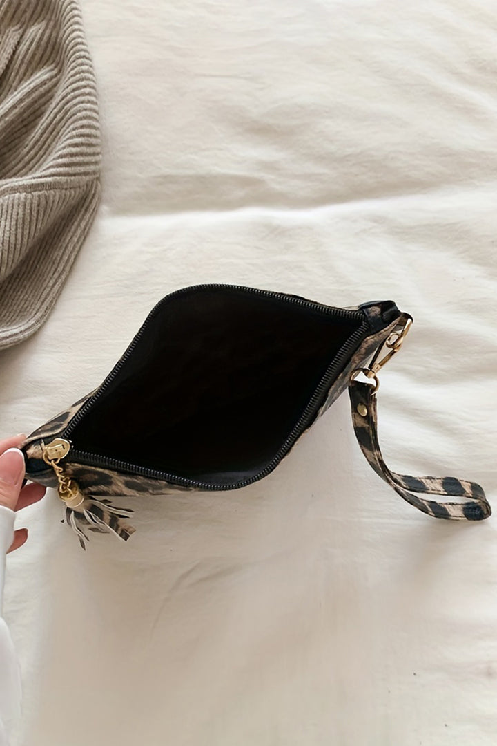 Geldbörse mit Reißverschluss und Handgelenksschlaufe im Leoparden-/Kuh-Print