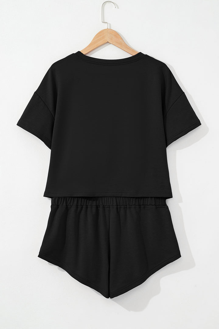 Black 2pcs Cropped Tee and Ruffle High Waist Skort Set