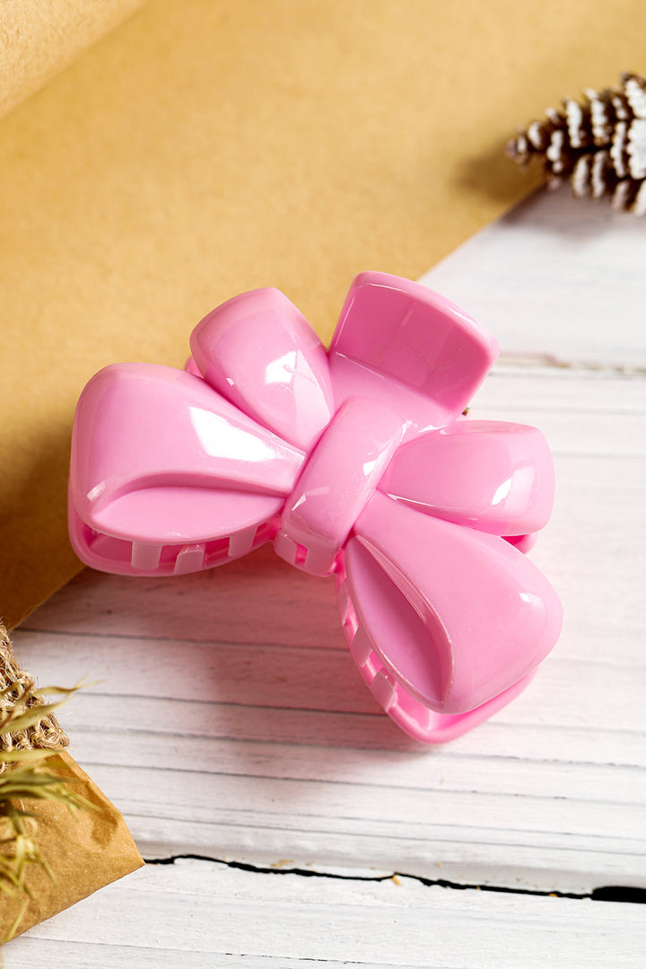 Pince à cheveux brillante en forme de nœud papillon