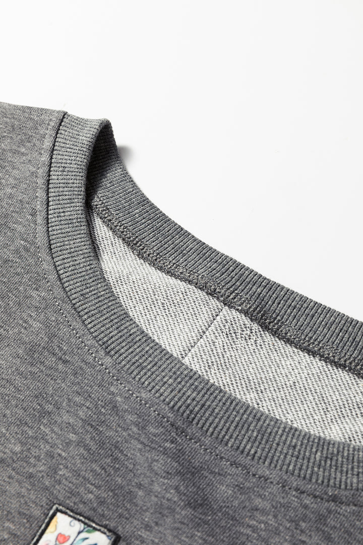 LOVE Graphic Exposed Seam Patchwork Uneven Hem Chic Sweatshirt