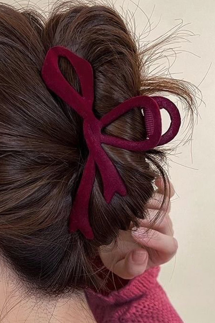 Grande pince à cheveux en velours avec nœud papillon