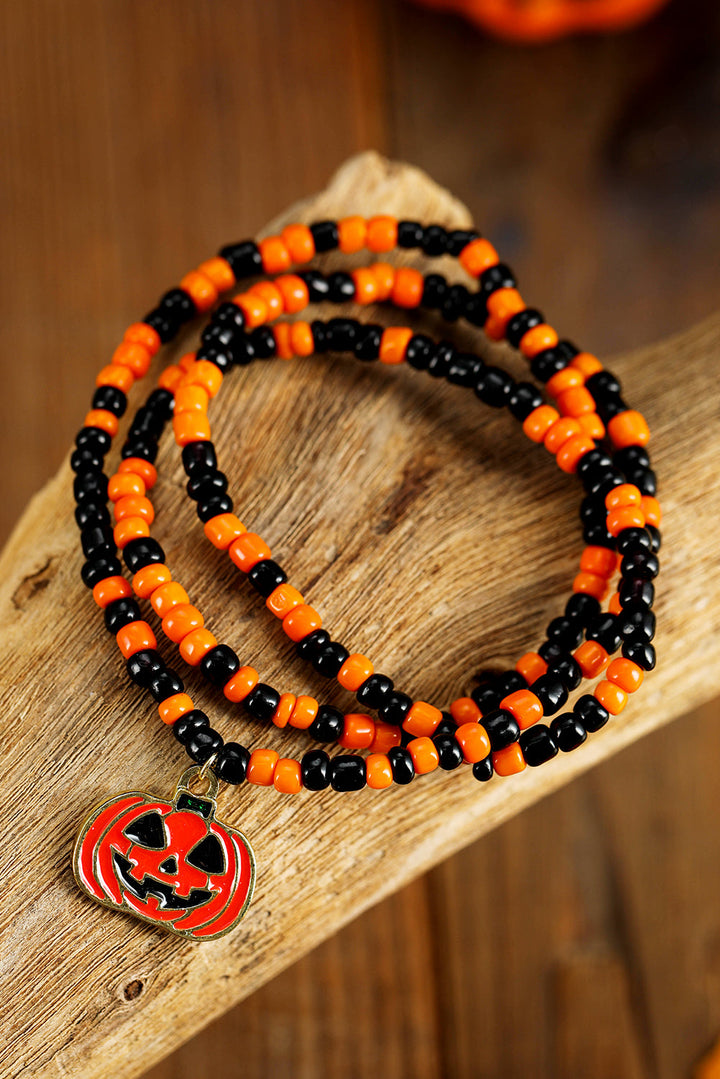 Collier d'Halloween avec pendentif en forme de visage de citrouille et perles de riz