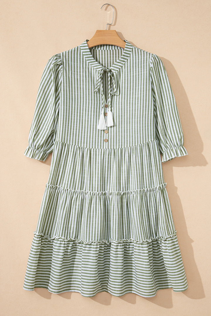 Tasseled Tie Neck Ruffled Short Sleeve Tiered Flattering Dress