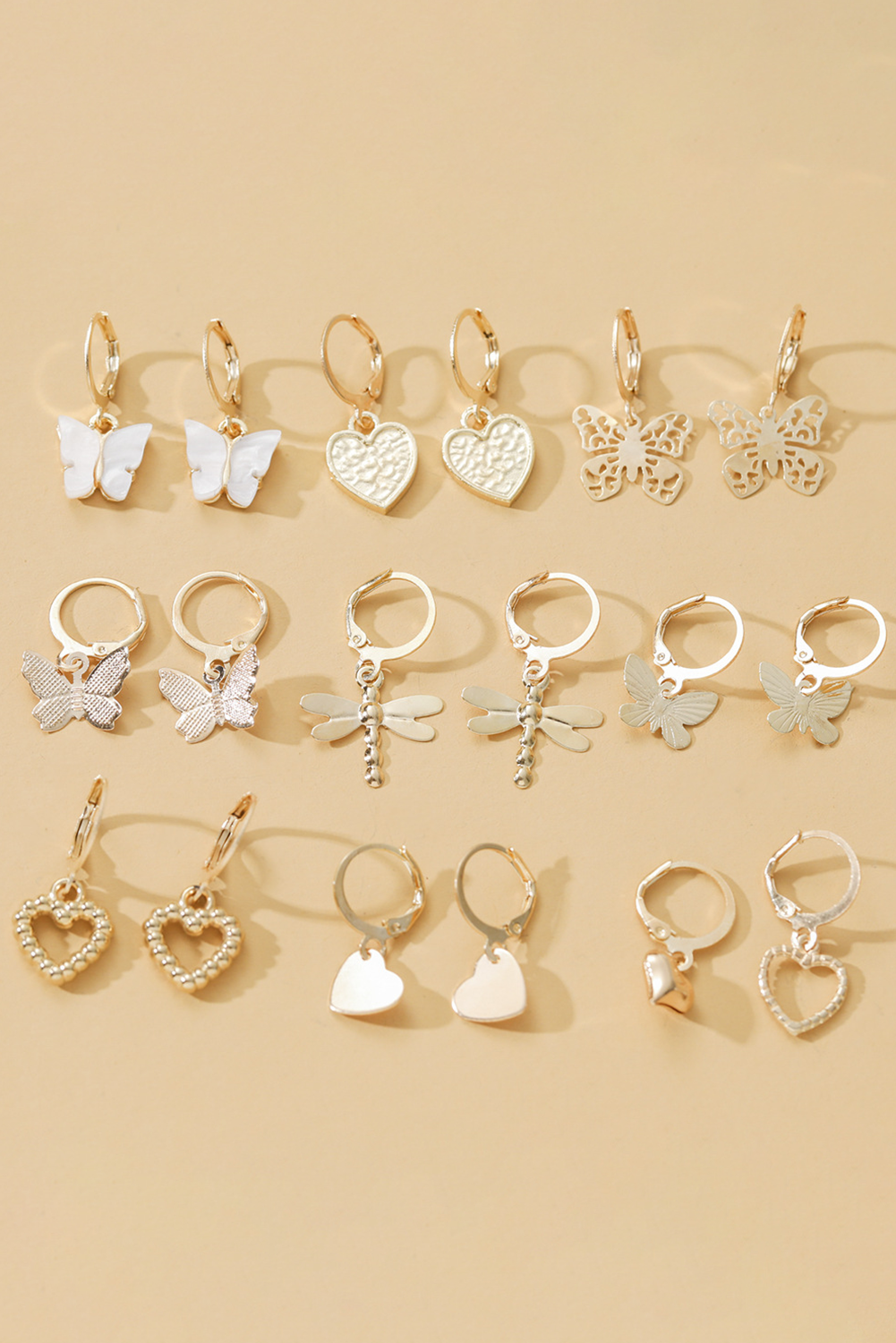 Boucles d'oreilles à crochet plaquées avec pendentif en forme de cœur et papillon