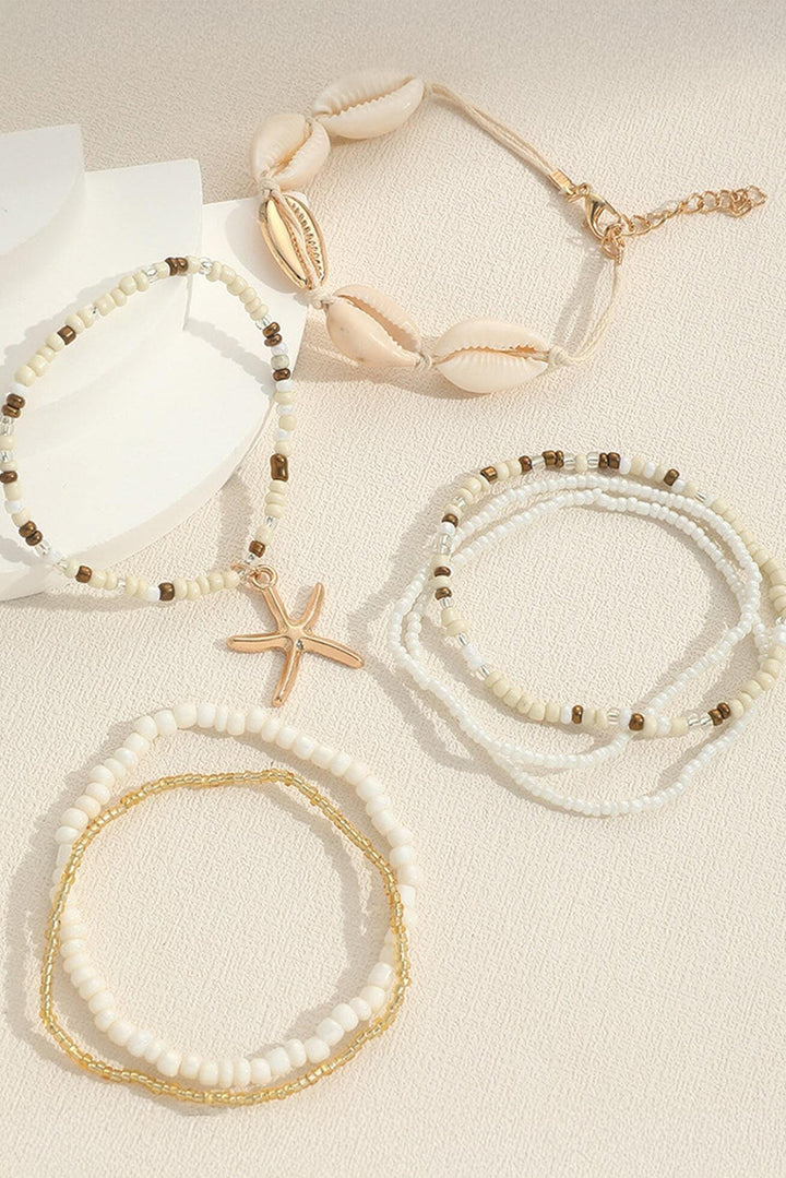 Ensemble de bracelets multicouches en perles avec décor de coquillages et d'étoiles de mer