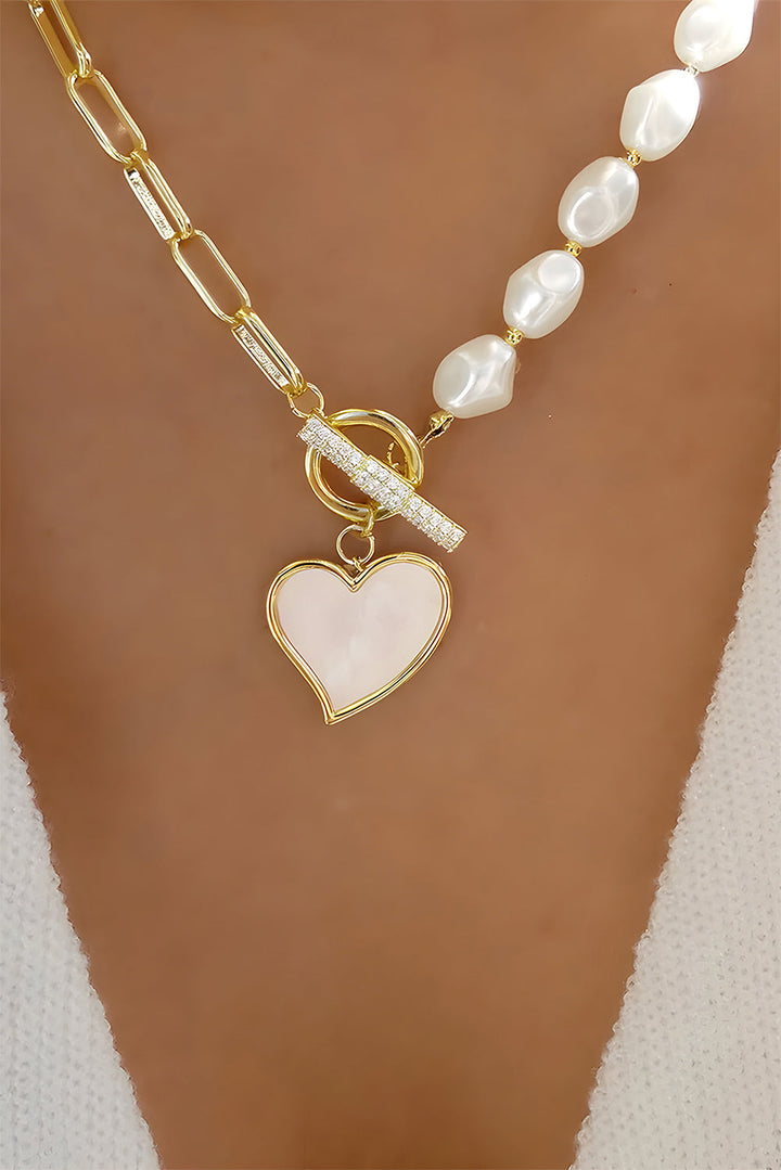 Collier avec pendentif en forme de cœur et chaîne de perles décorée de strass