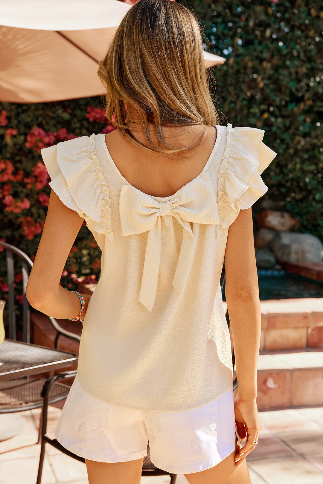 Apricot Solid Color Bow Detail Back Ruffled Sleeveless Top