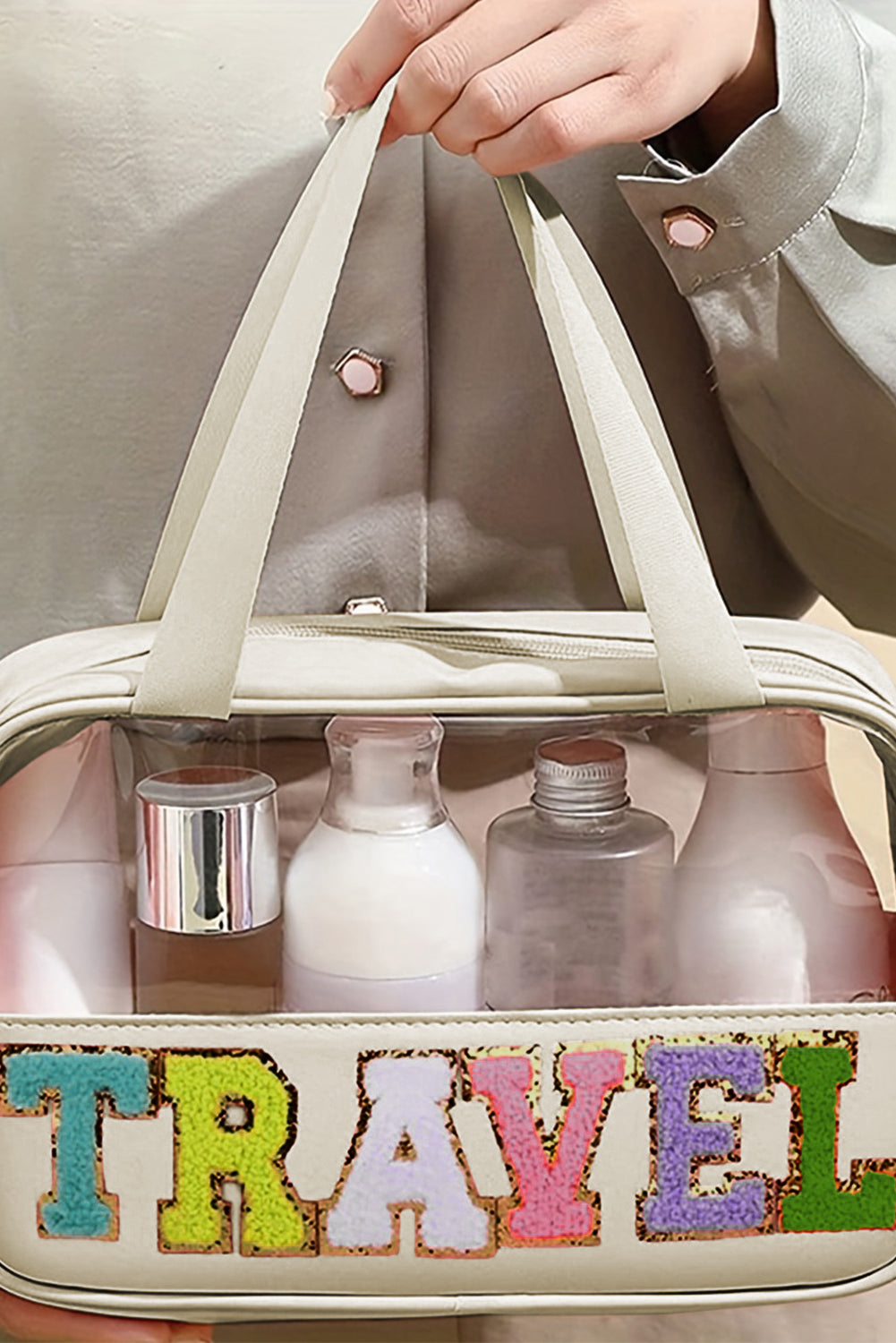 Trousse de maquillage TRAVEL en PVC transparent avec lettres en chenille