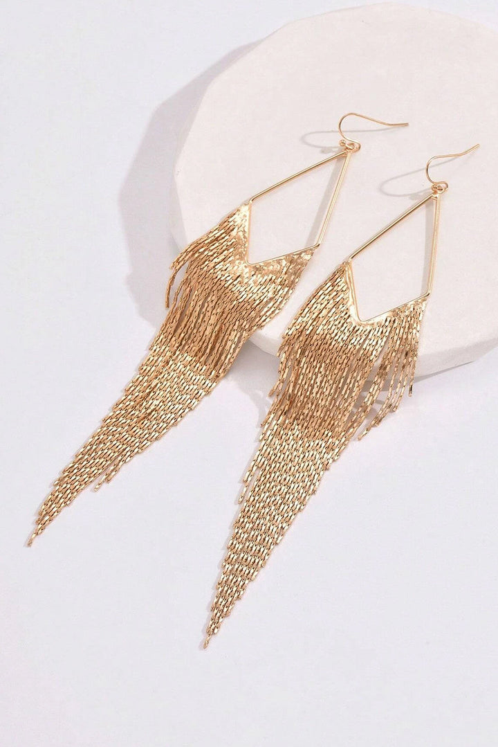 Boucles d'oreilles pendantes à longue chaîne et pompon