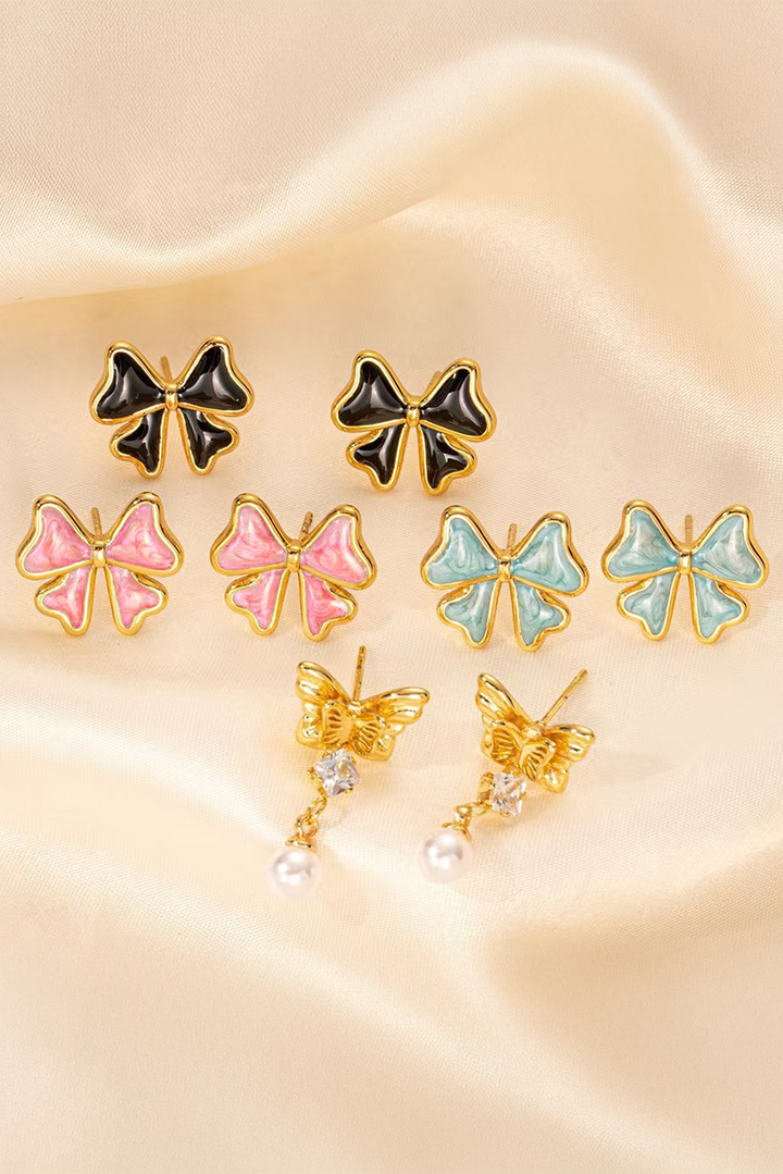 Boucles d'oreilles à tige en émail avec nœud papillon
