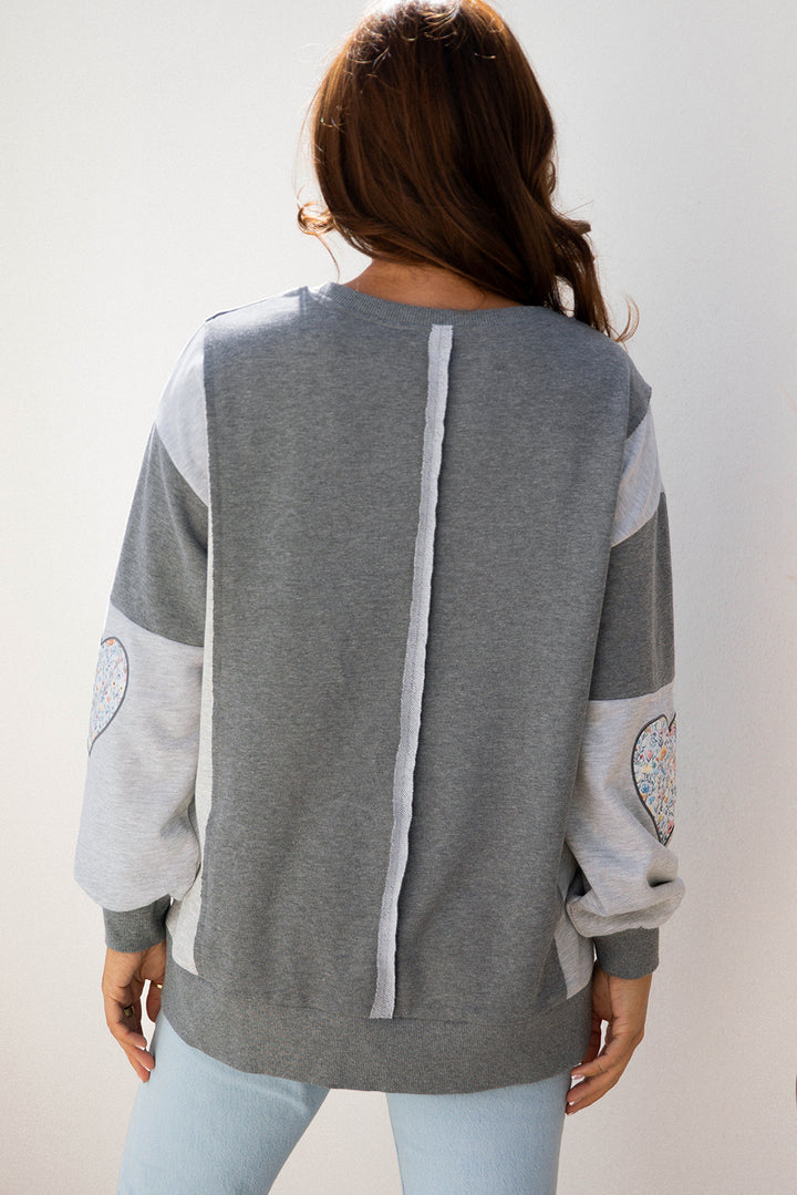 LOVE Graphic Exposed Seam Patchwork Uneven Hem Chic Sweatshirt