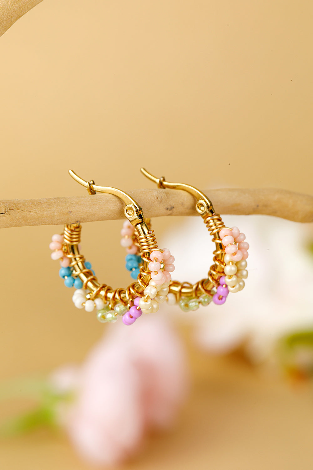 Boucles d'oreilles créoles en alliage avec fleurs perlées
