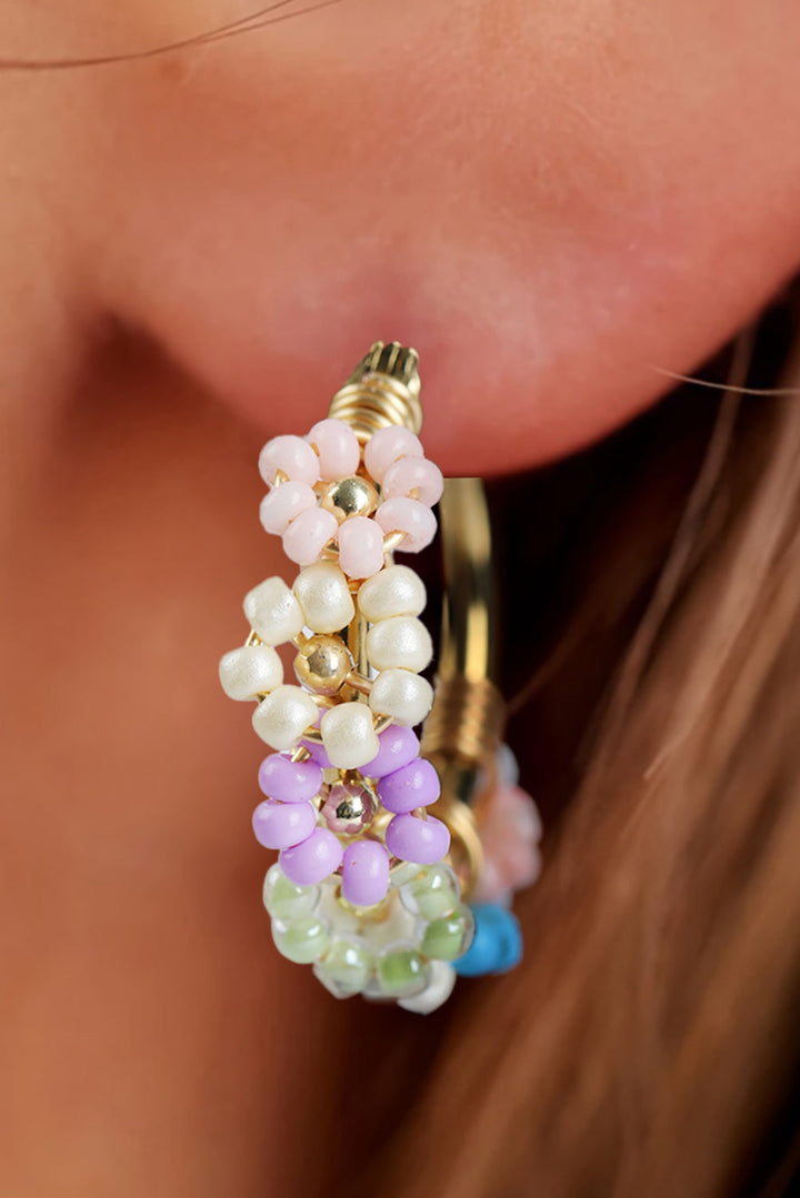 Boucles d'oreilles créoles en alliage avec fleurs perlées