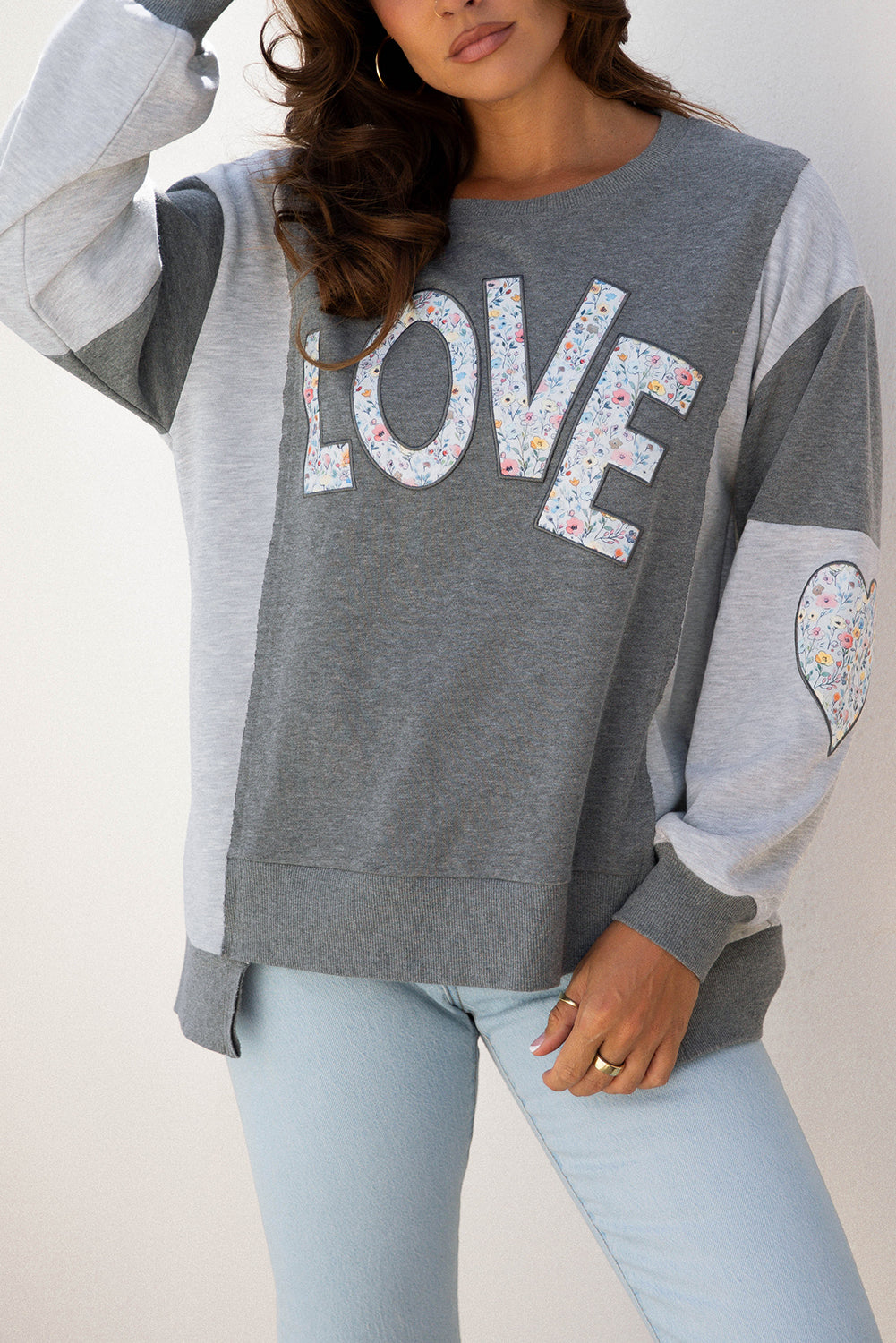 LOVE Graphic Exposed Seam Patchwork Uneven Hem Chic Sweatshirt