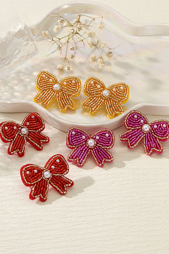 Boucles d'oreilles à tige en forme de nœud en perles de riz
