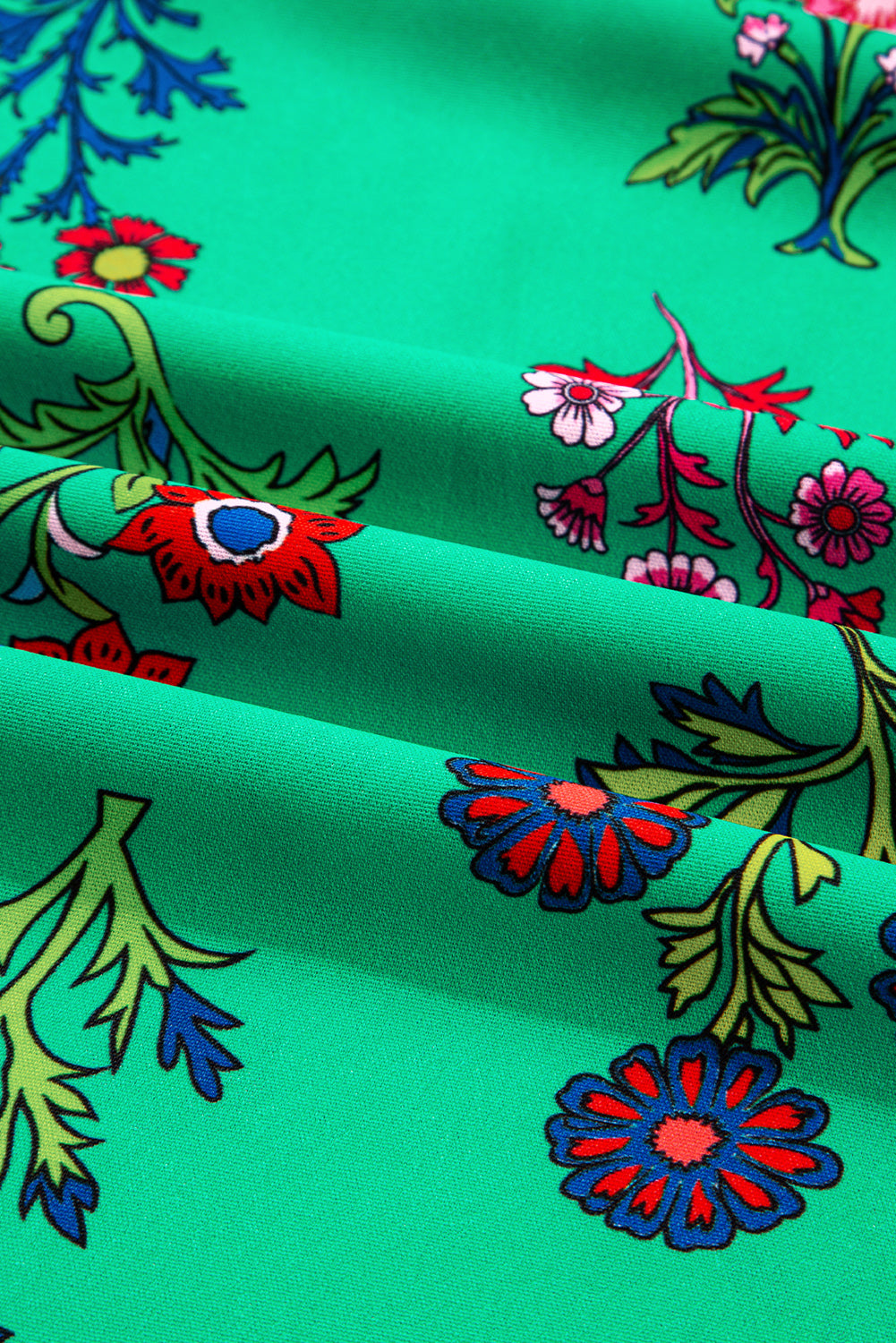 Robe mini boutonnée à volants et manches trois-quarts fleuries