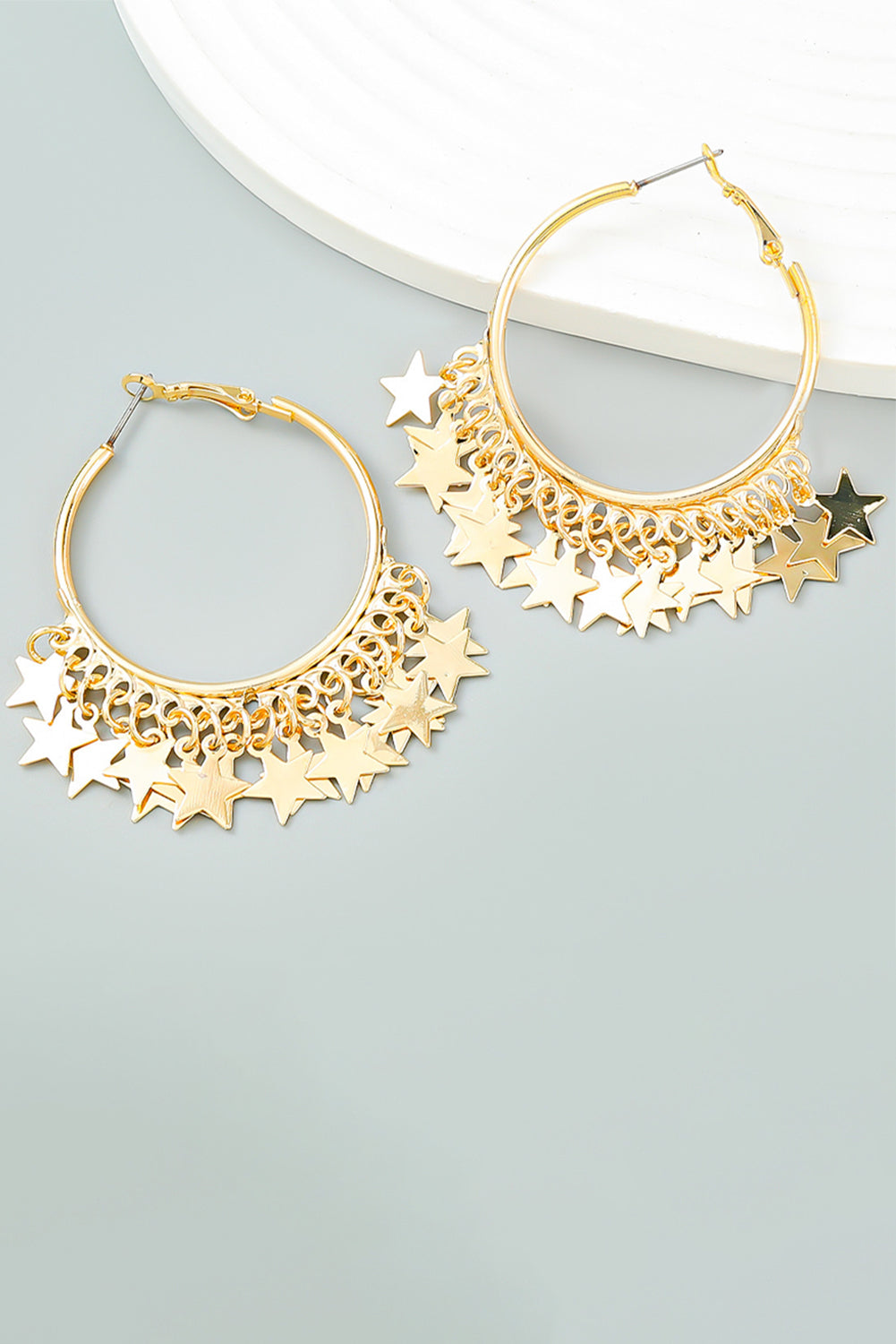 Boucles d'oreilles créoles en alliage avec breloques étoiles