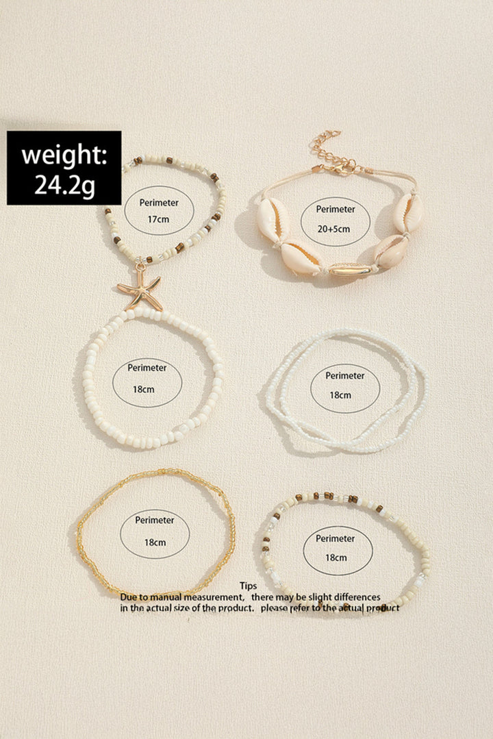 Ensemble de bracelets multicouches en perles avec décor de coquillages et d'étoiles de mer