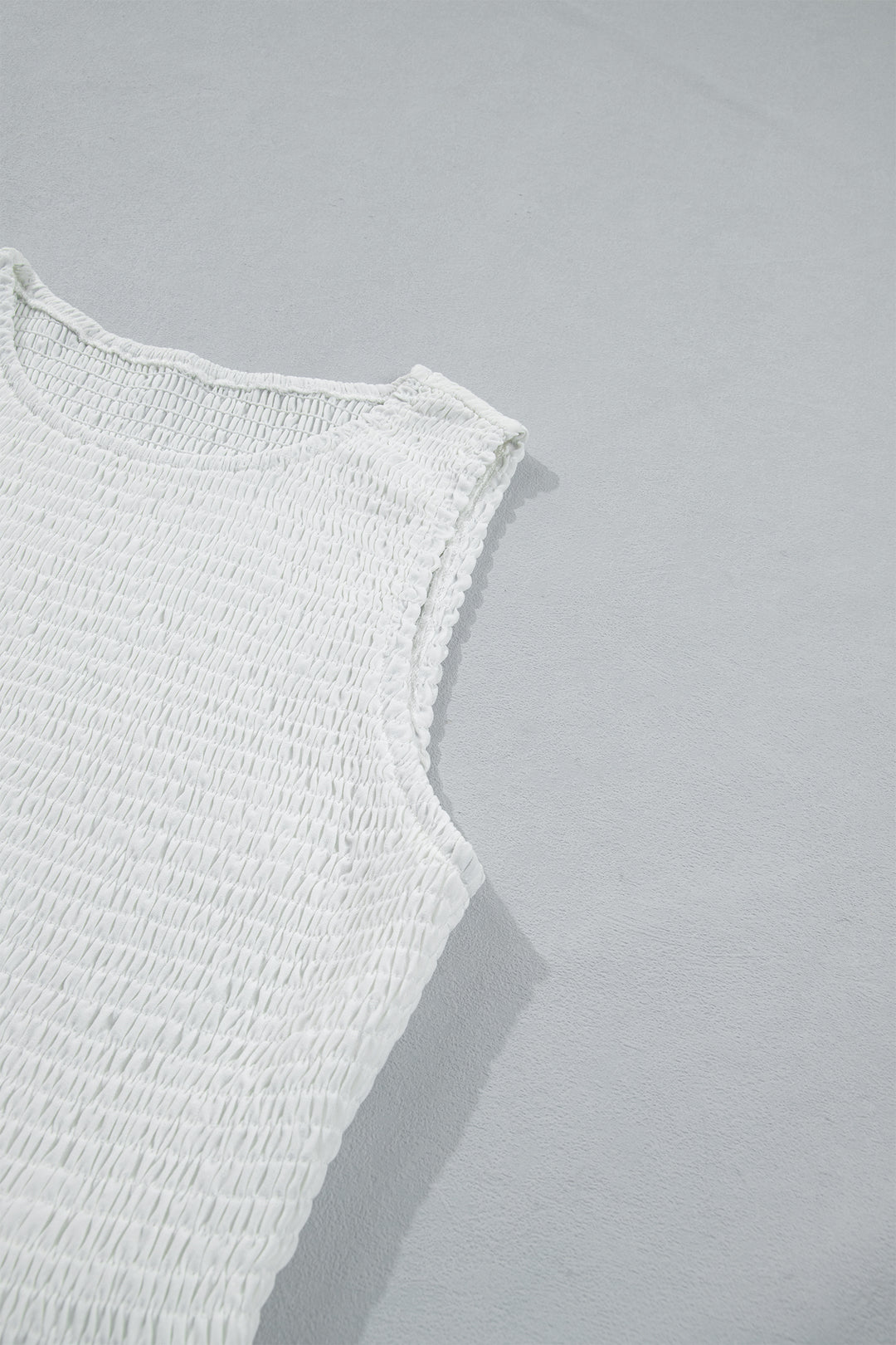 Chic White Sleeveless Smocked Lace Peplum Top