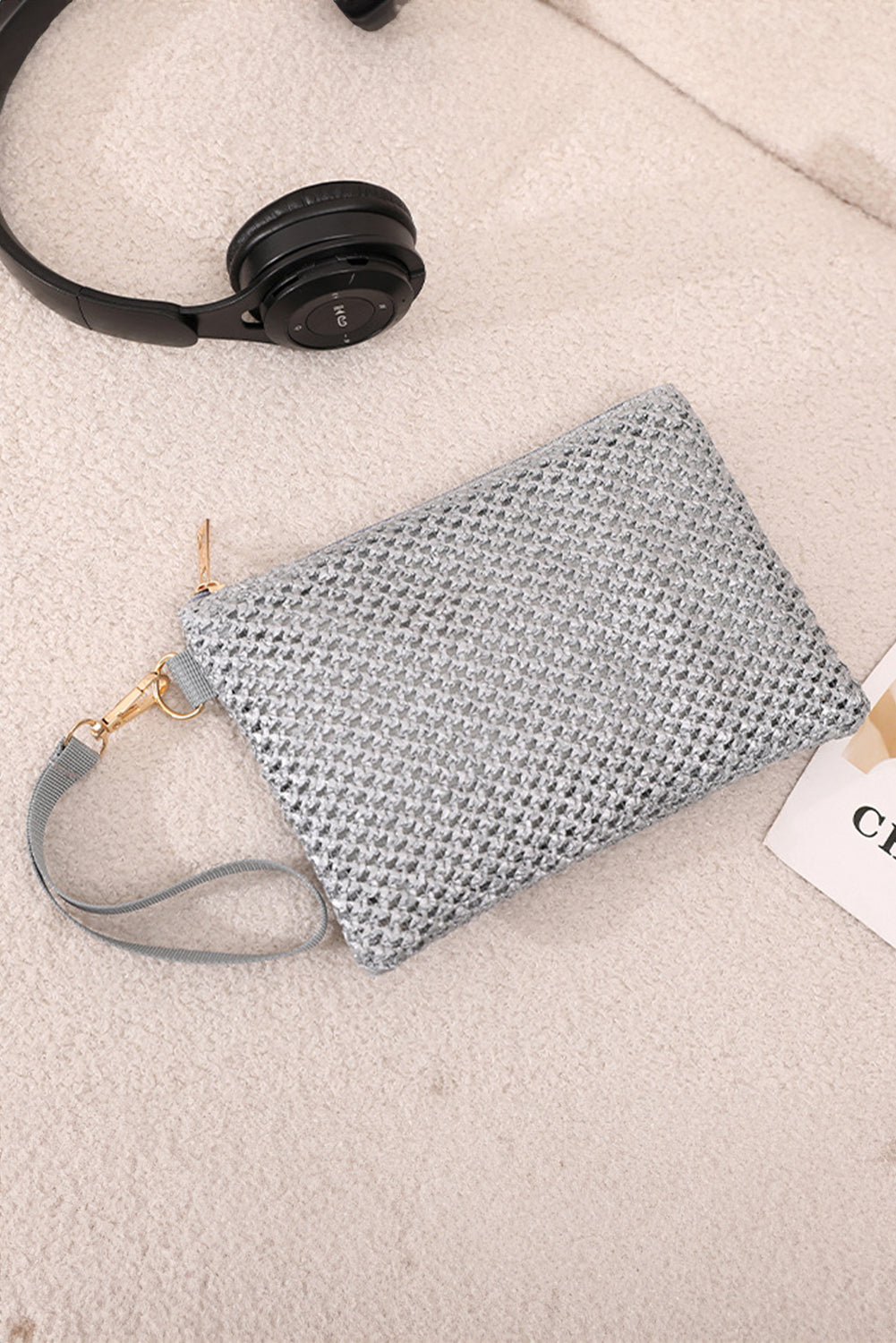 Sac à main carré tissé avec fermeture éclair et dragonne