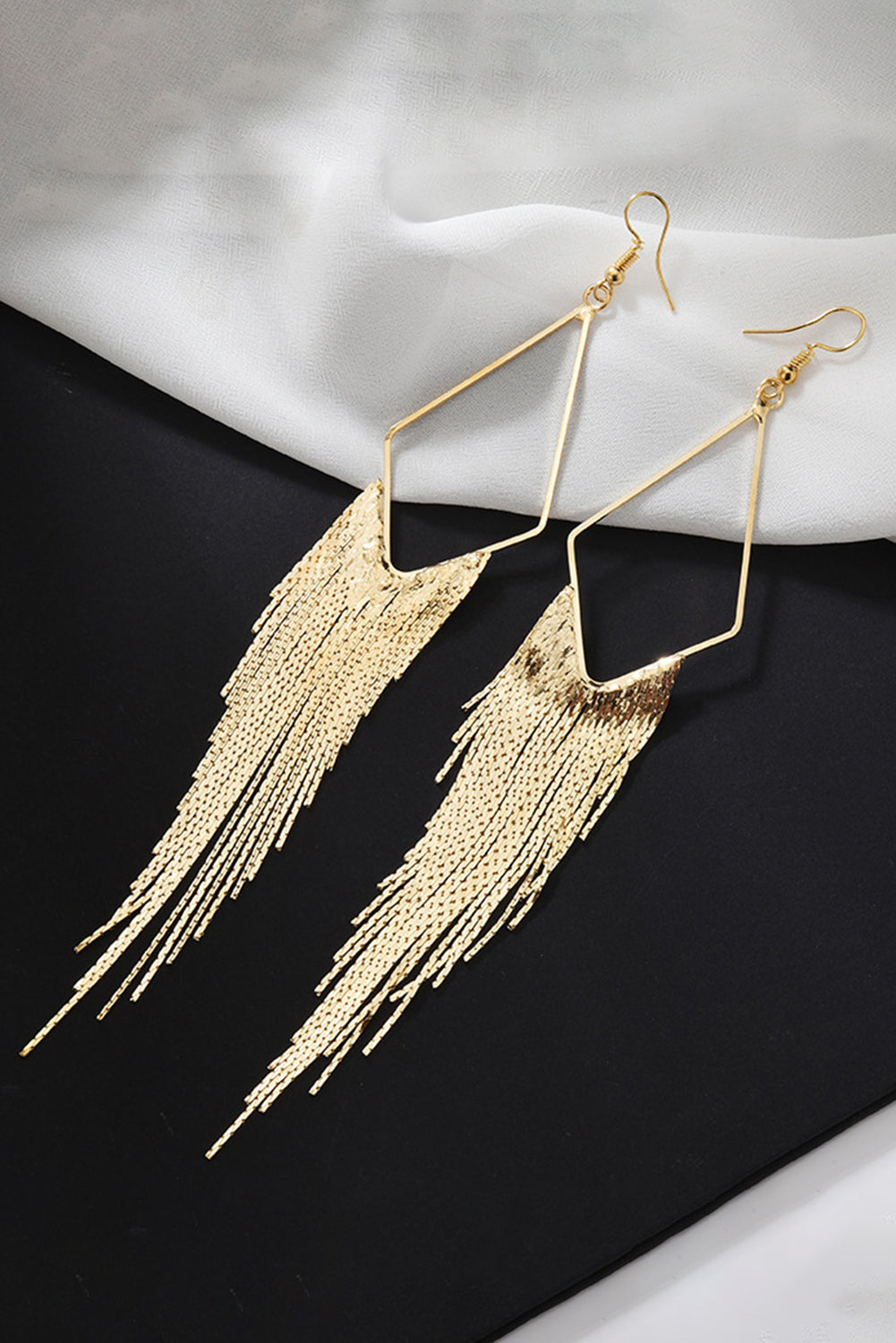 Boucles d'oreilles pendantes à longue chaîne et pompon