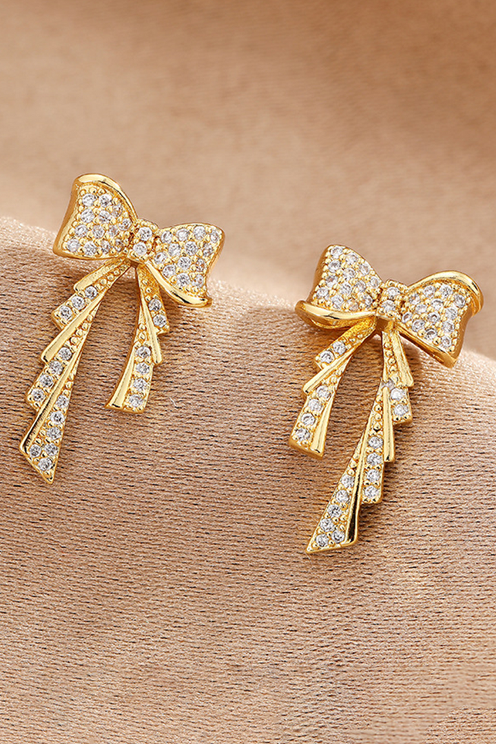 Boucles d'oreilles à tige plaquées avec nœud en strass
