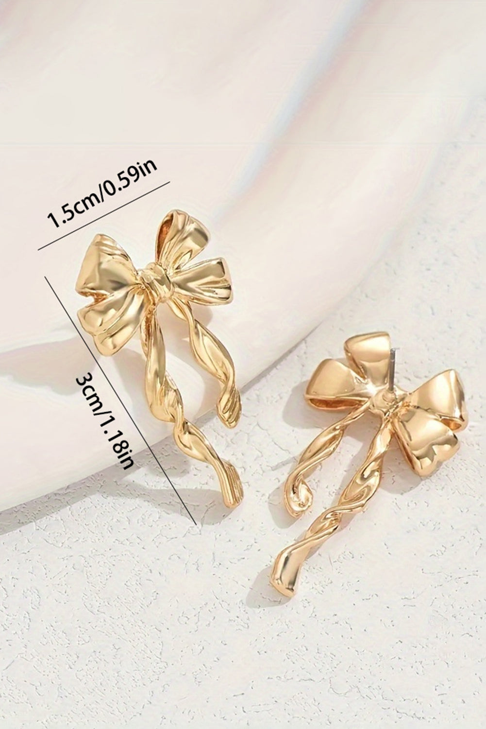 Boucles d'oreilles à tige en alliage plaqué nœud papillon