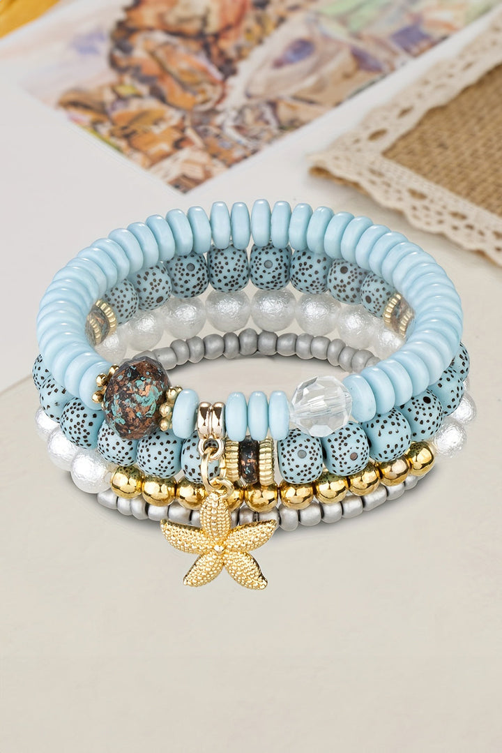 Ensemble de 4 bracelets de perles avec pendentif étoile de mer