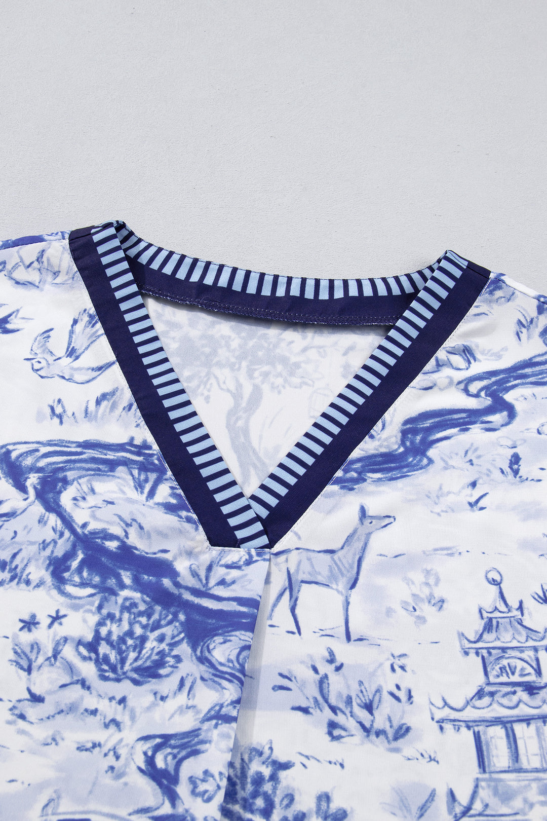 Blue Wild Animal Paradise Striped Trim V Neck Short Sleeve Blouse