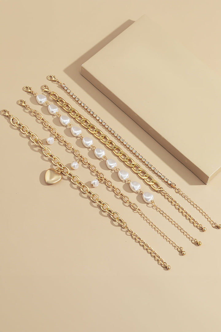 Armband-Set mit Herzanhänger und Perlen und Strass