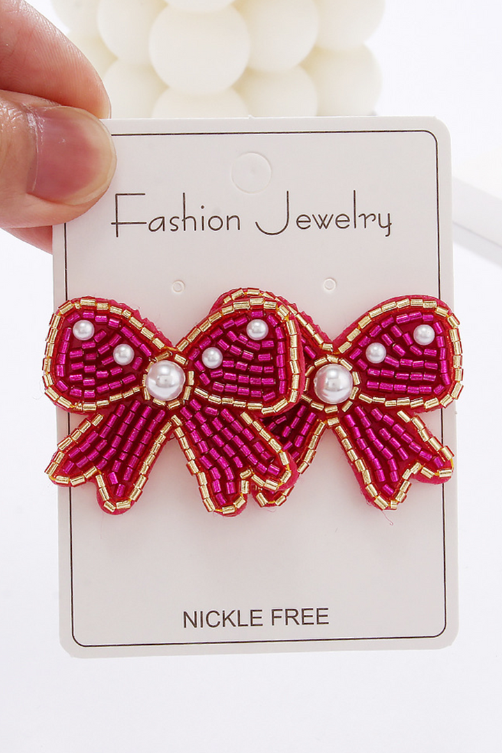 Boucles d'oreilles à tige en forme de nœud en perles de riz