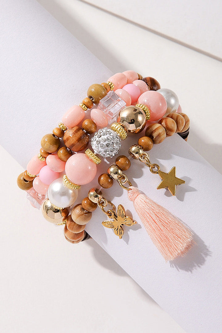 Ensemble de 4 bracelets à pompons et pendentifs en forme d'étoile et de papillon