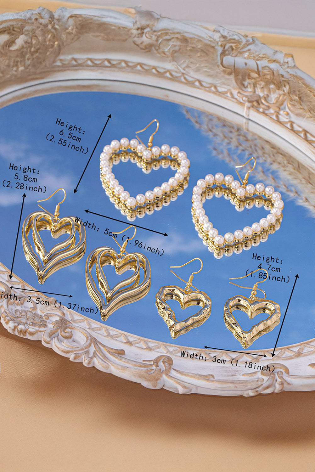 Boucles d'oreilles pendantes en alliage plaqué en forme de double cœur