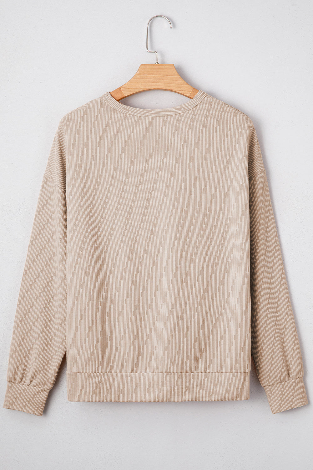 Solid Color Textured Long Sleeve Top
