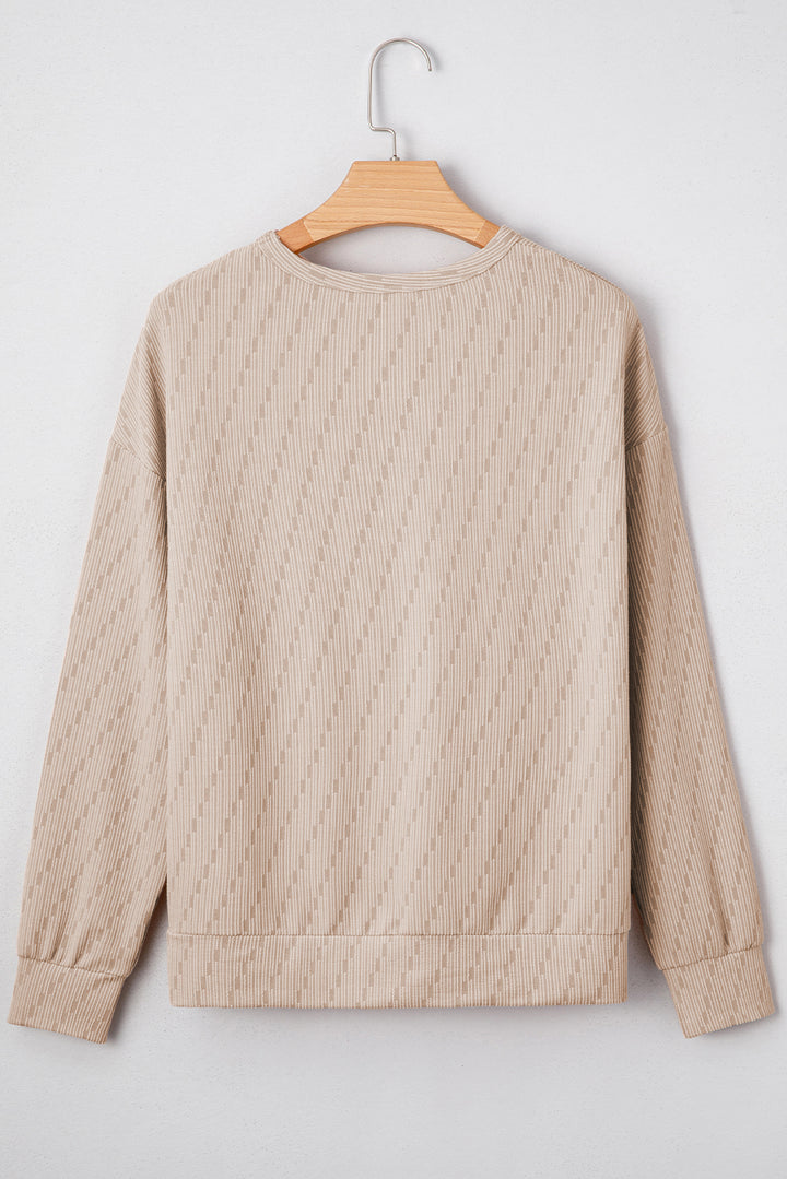 Solid Color Textured Long Sleeve Top