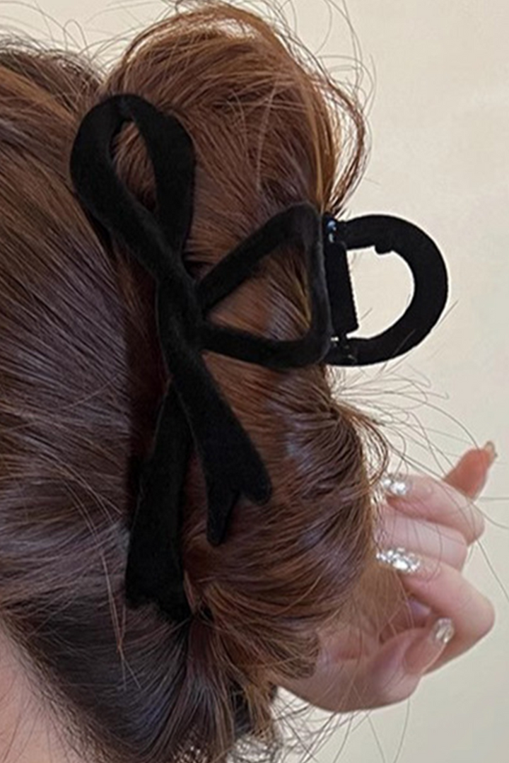 Grande pince à cheveux en velours avec nœud papillon