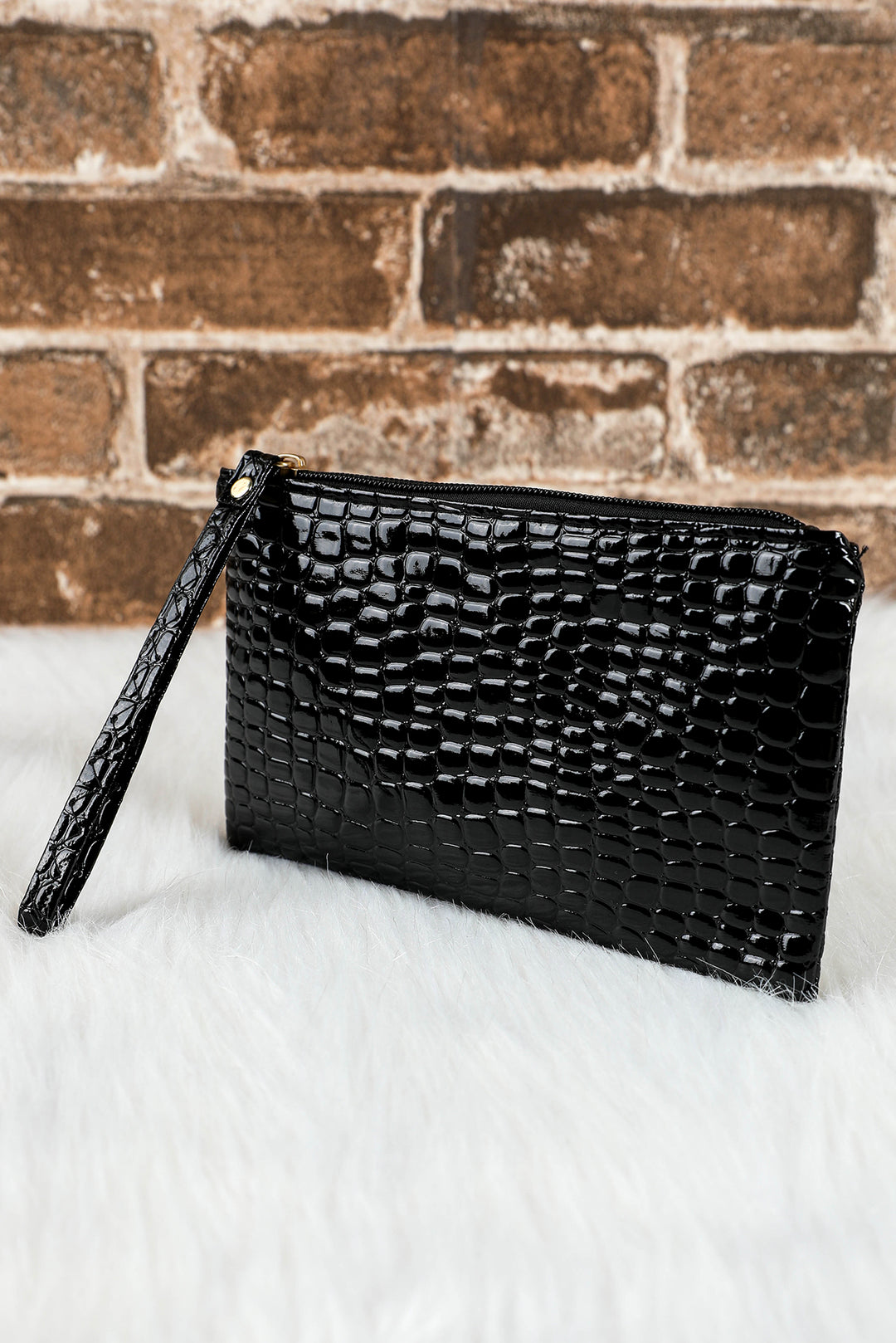 Portefeuille à dragonne zippé motif crocodile