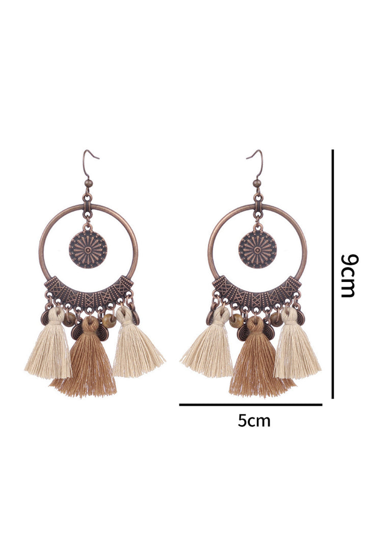 Boucles d'oreilles pendantes rondes à pompons style bohème