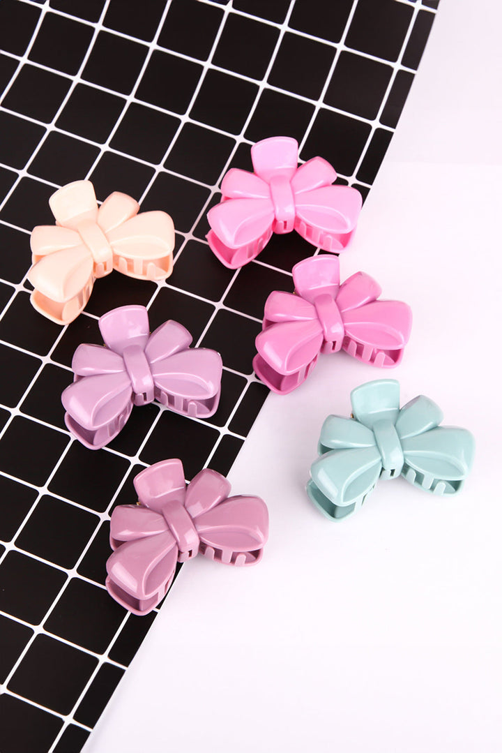 Pince à cheveux brillante en forme de nœud papillon