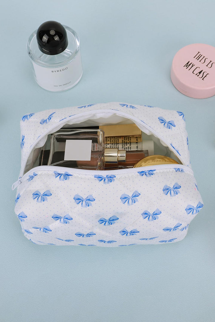 Trousse de maquillage matelassée à fermeture éclair et nœud papillon