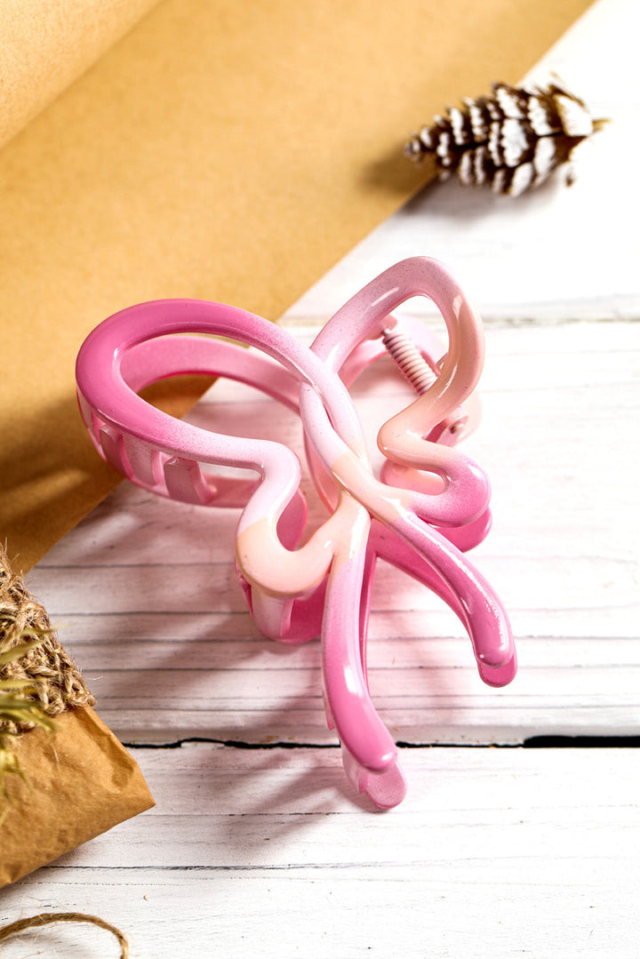 Pince à cheveux brillante en forme de papillon