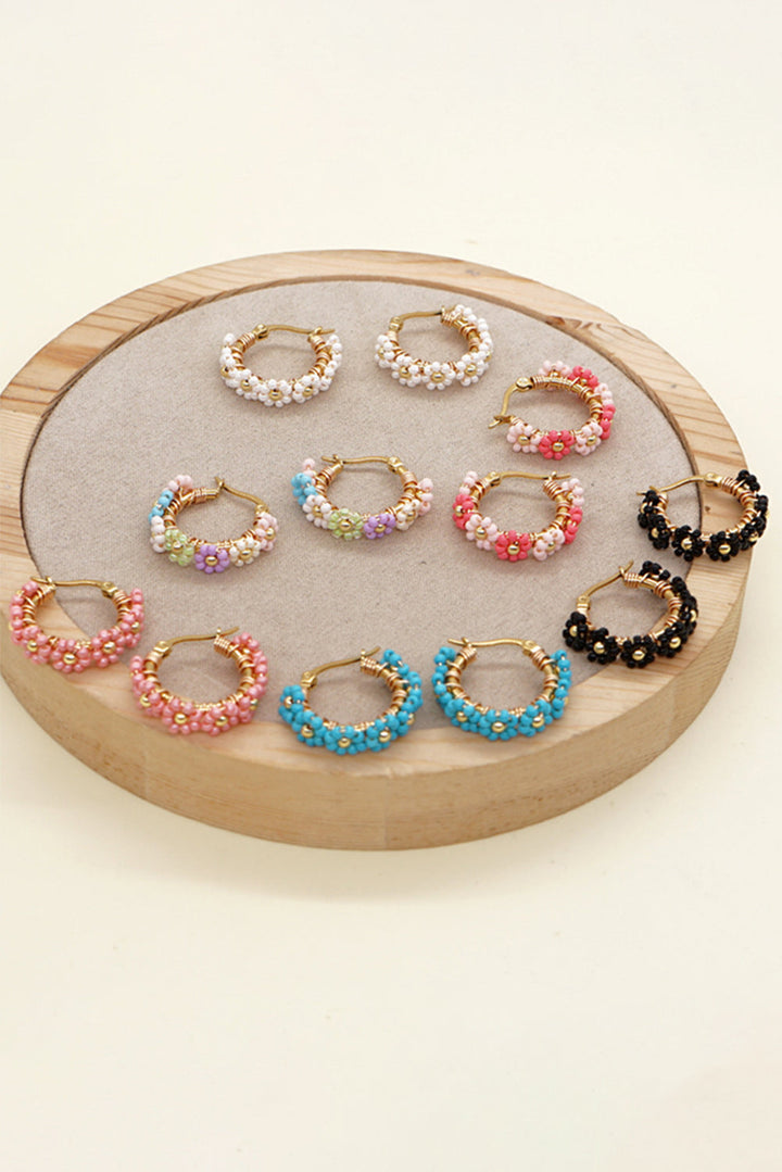 Boucles d'oreilles créoles en alliage avec fleurs perlées