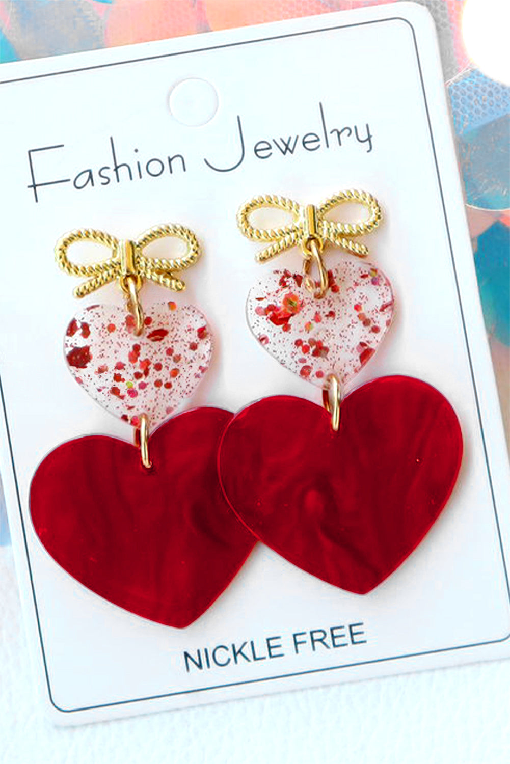 Boucles d'oreilles pendantes en forme de cœur et de nœud papillon